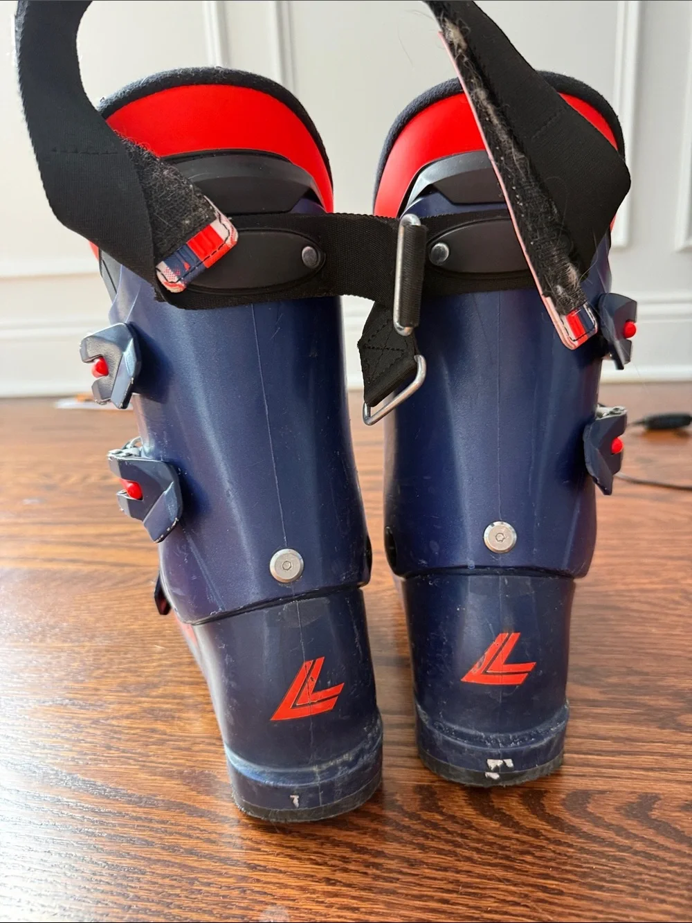Lange Kids Blue Ski Boots with Orange Pull Tabs